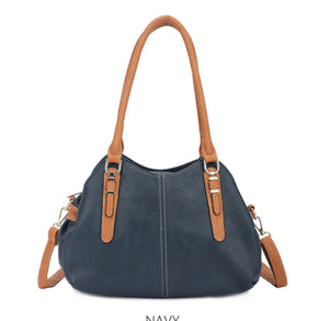 Triple compartment shoulder bag