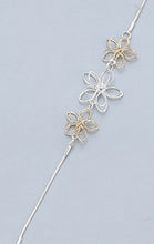 Load image into Gallery viewer, Long silver and gold ‘flower’ necklace
