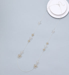 Long silver and gold ‘flower’ necklace