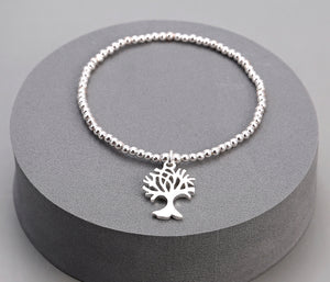 Silver plated elasticated bracelet with tree pendant